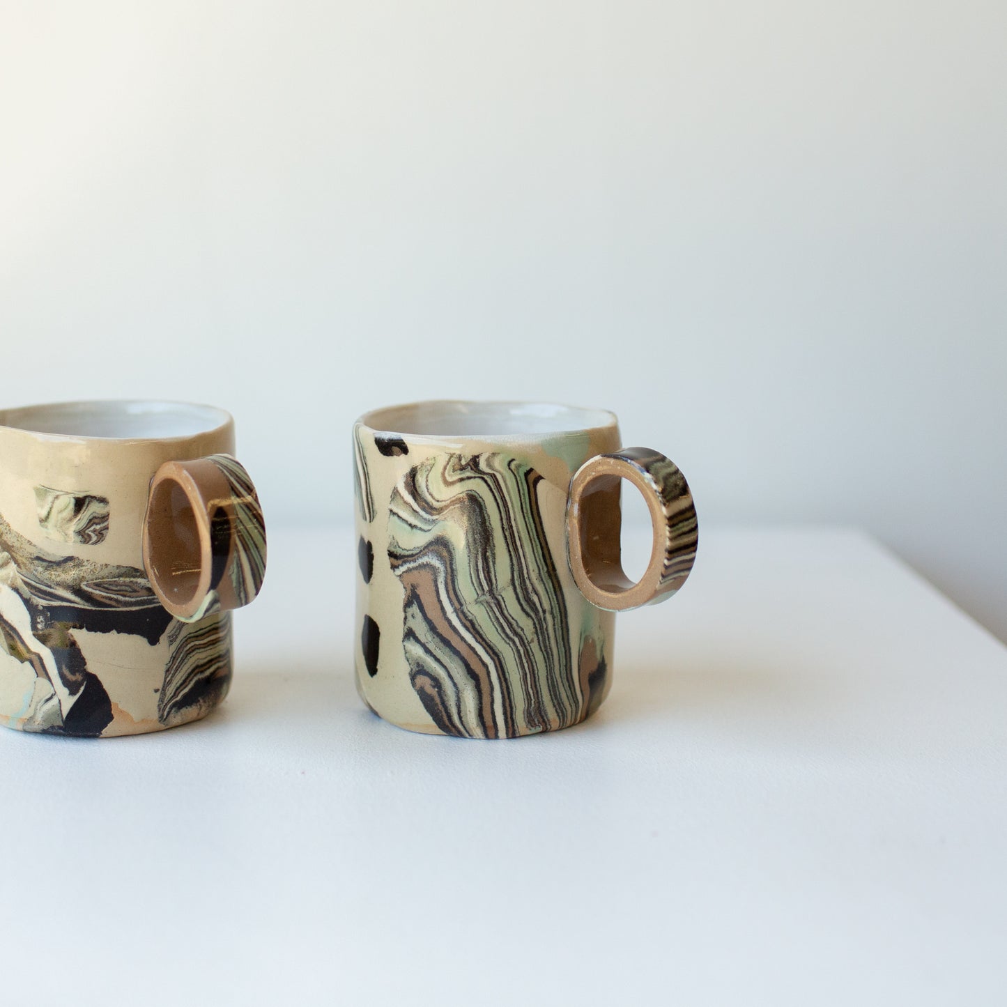 ‘Up the Cliff’ mugs