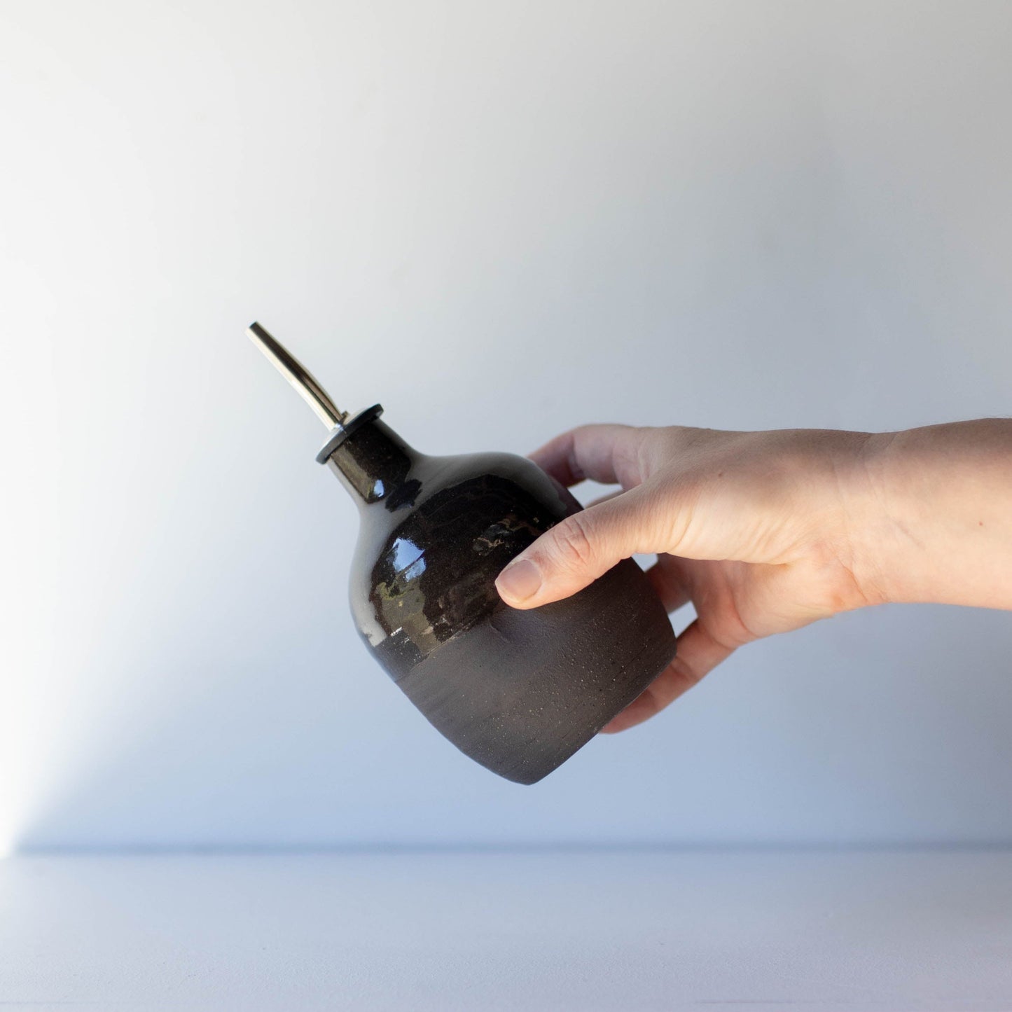 Lil Ceramics small oil pourer charcoal handmade in New Zealand