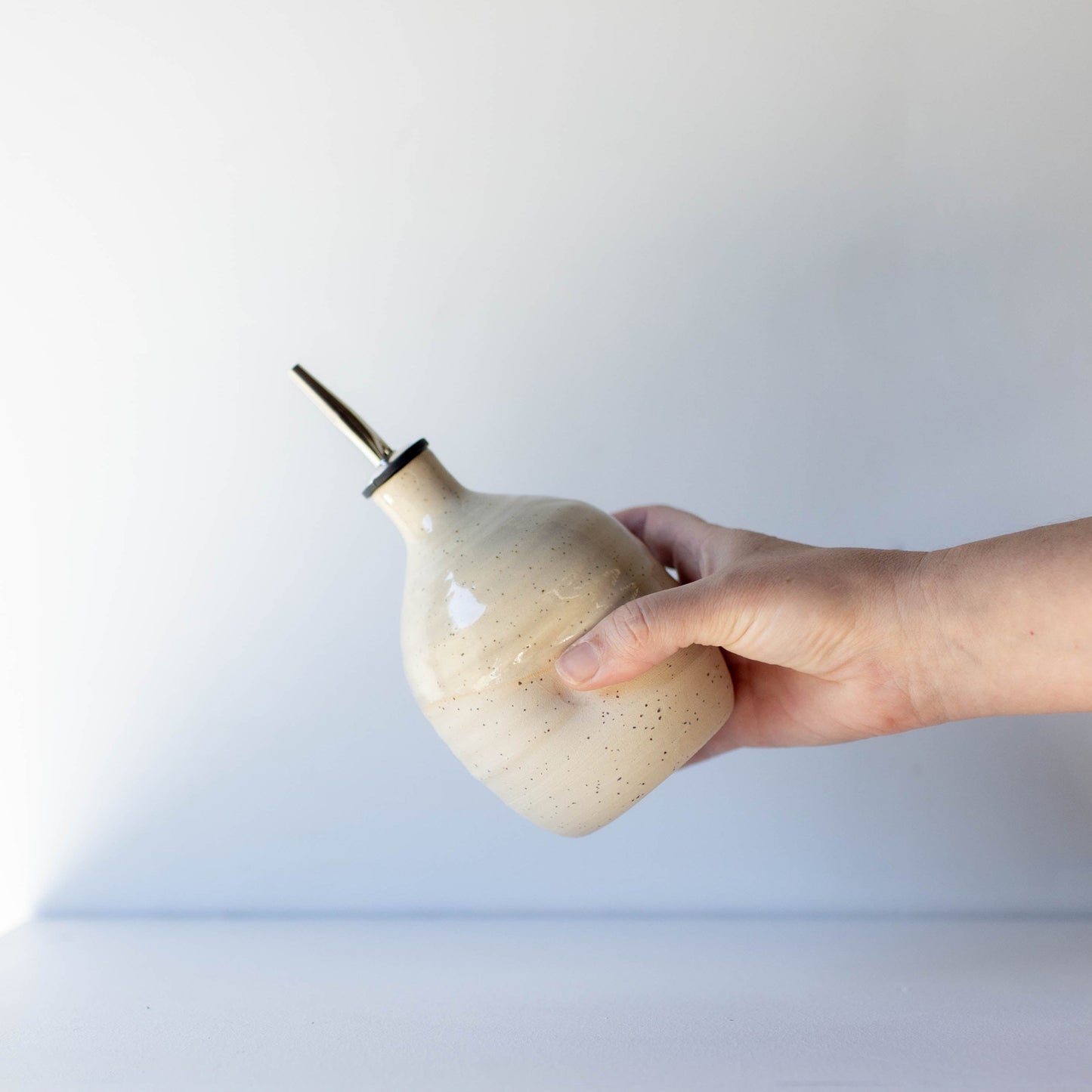 Lil_Ceramics_small_oil_pourer_cream speckle_handmade_in_New_Zealand