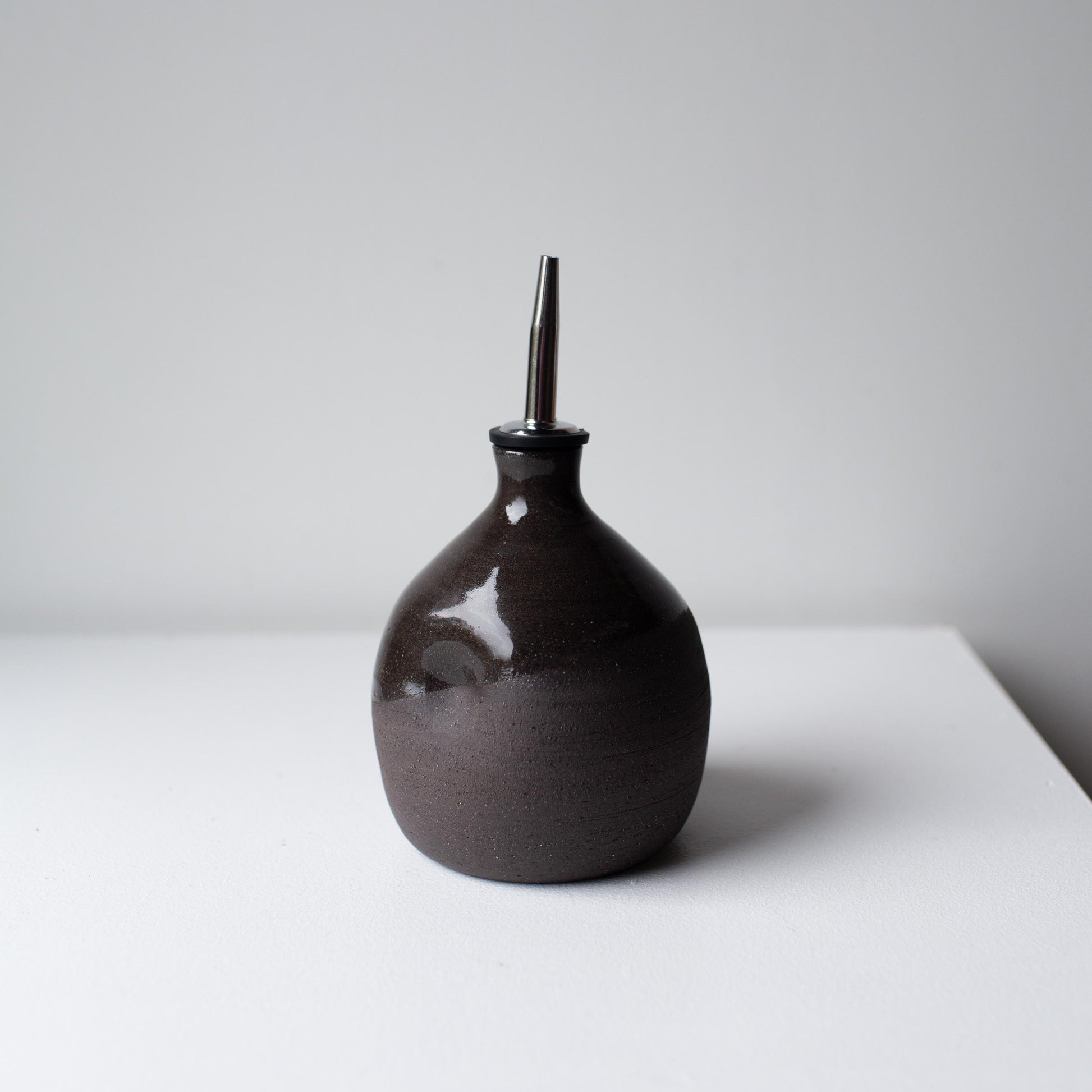 Lil Ceramics handmade oil pourer in charcoal, handmade in Auckland, New Zealand