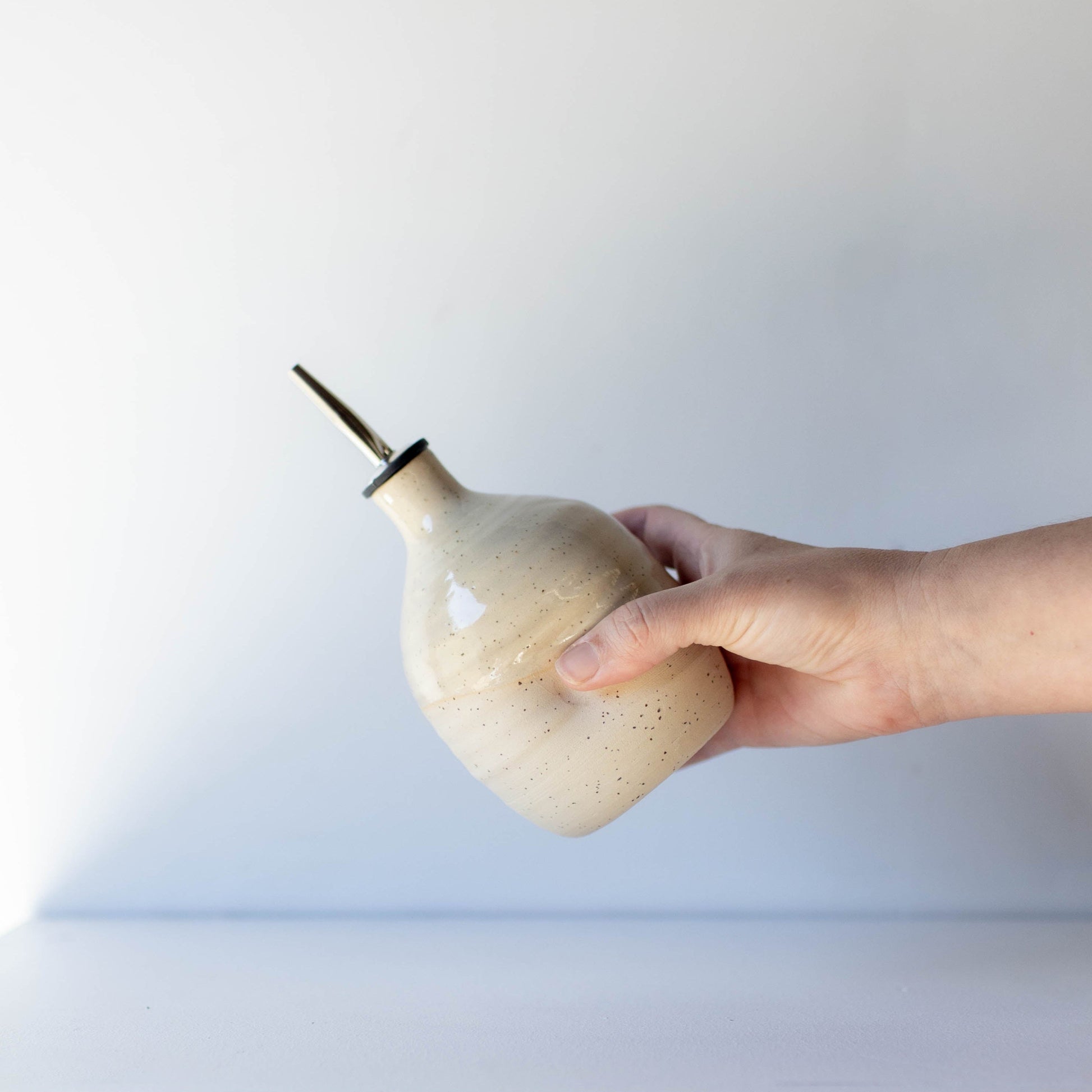 Lil_Ceramics_small_oil_pourer_cream speckle_handmade_in_New_Zealand